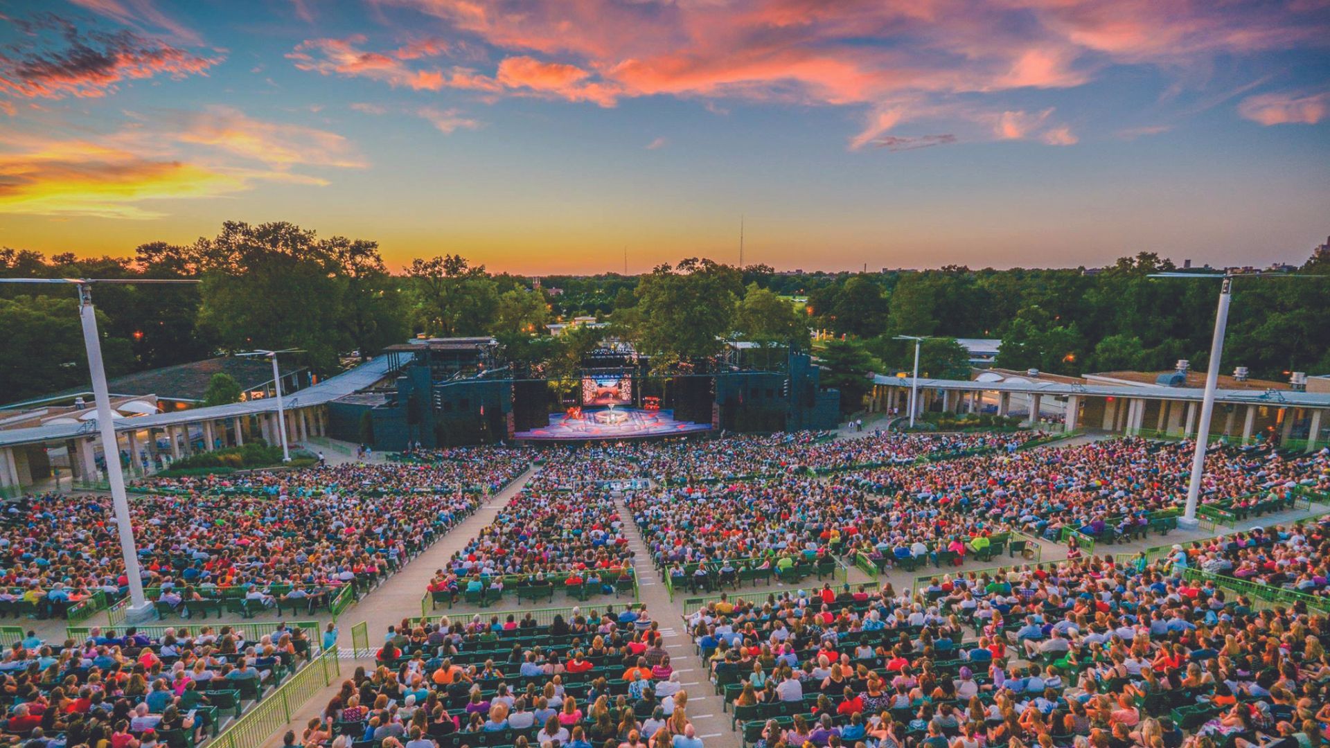 Thousands of theatergoers watch a Broadway performance at The Muny.