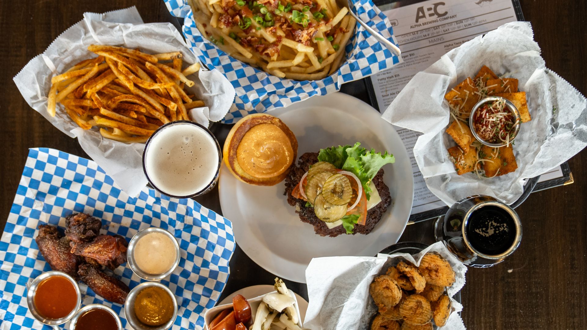 Alpha Brewing Company has a food program featuring burgers, wings and pickles.