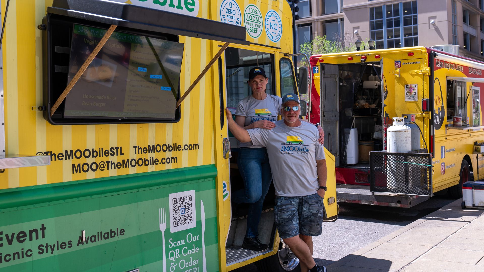 Rachelle L’Ecuyer and Ken Evans pose by their food truck, The MOObile.