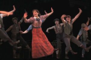 The cast of Newsies dances during a STAGES St. Louis production.