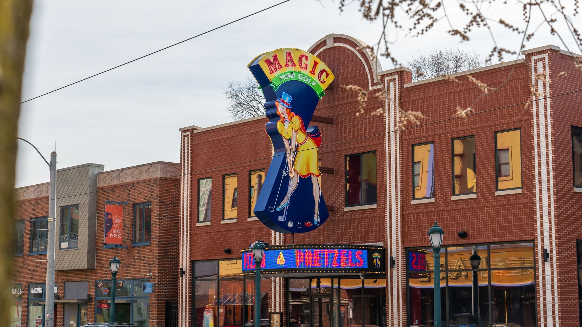 Magic Mini Golf is marked by a neon sign.