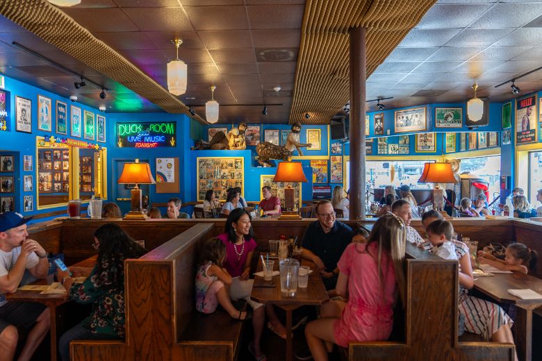 Families enjoy food among the memorabilia of Blueberry Hill.