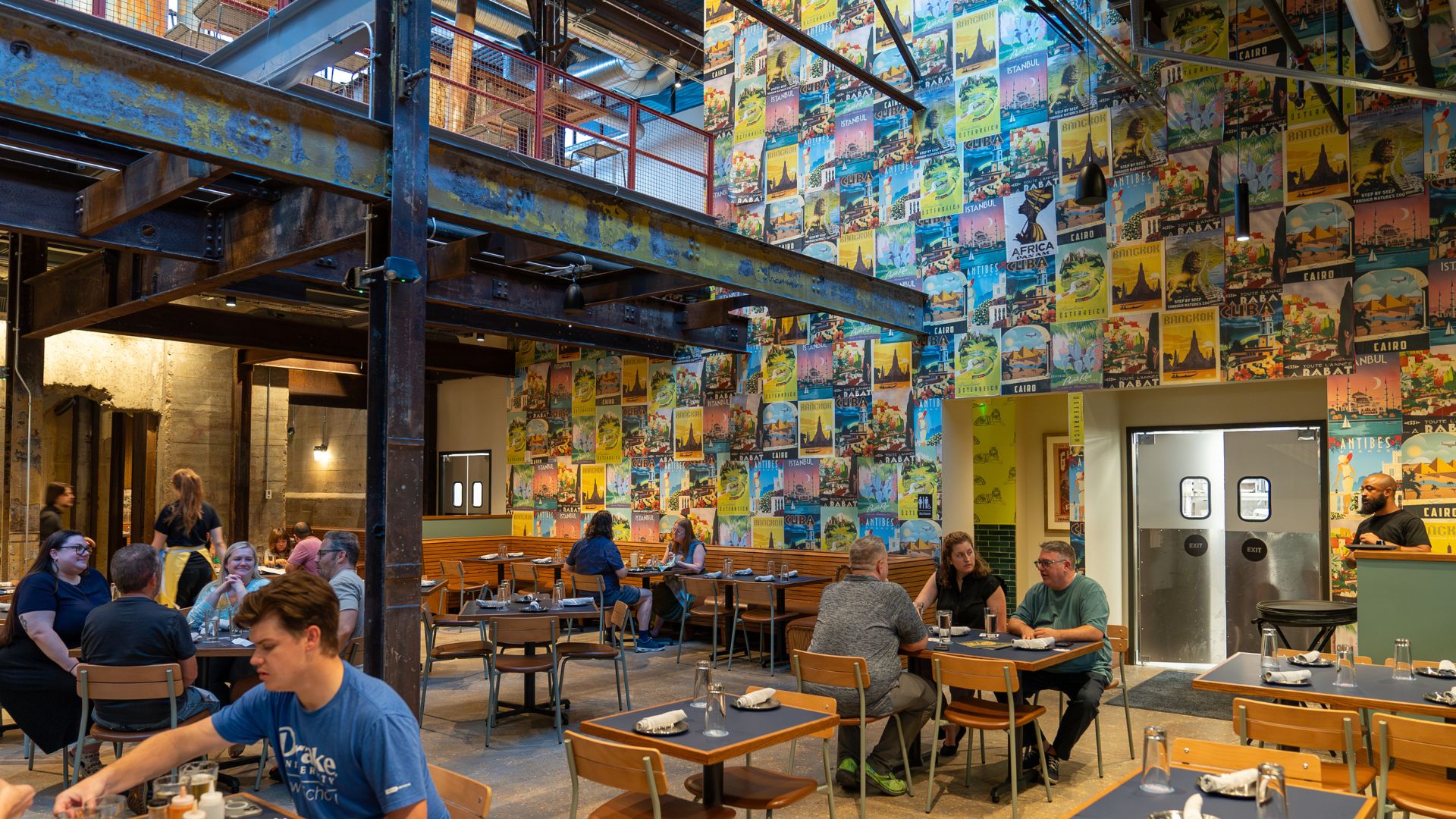 The main dining room of Expat BBQ combines color and concrete.