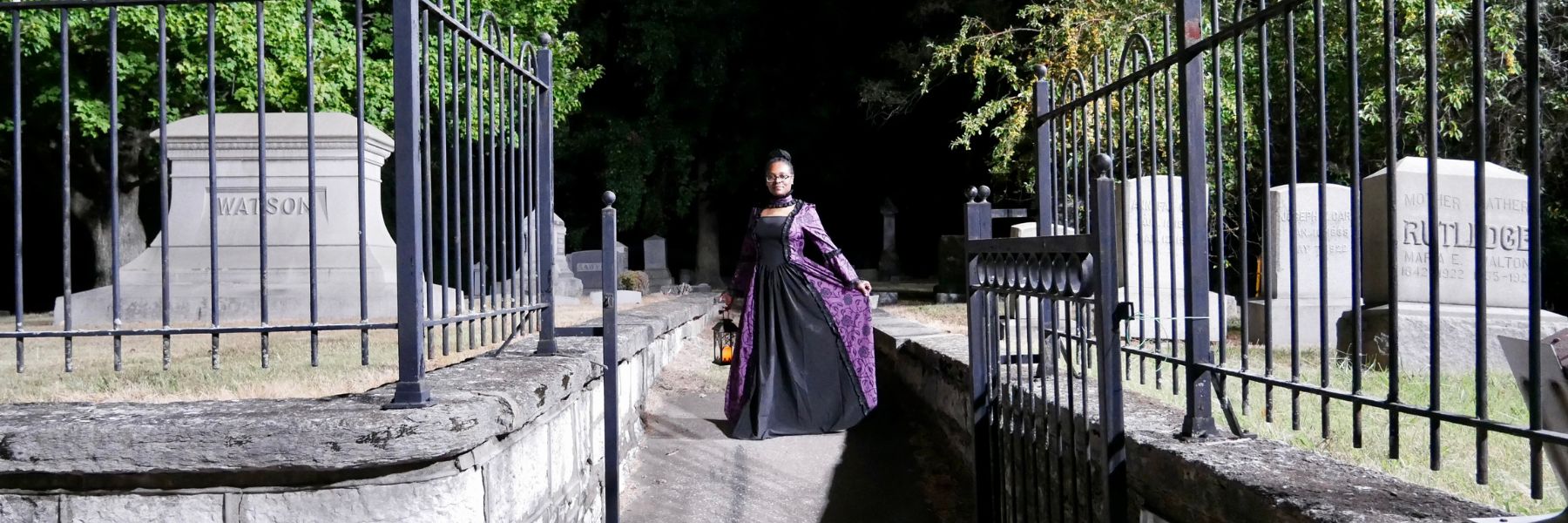 A clairvoyant guide leads a haunted bus tour into the Alton National Cemetery.