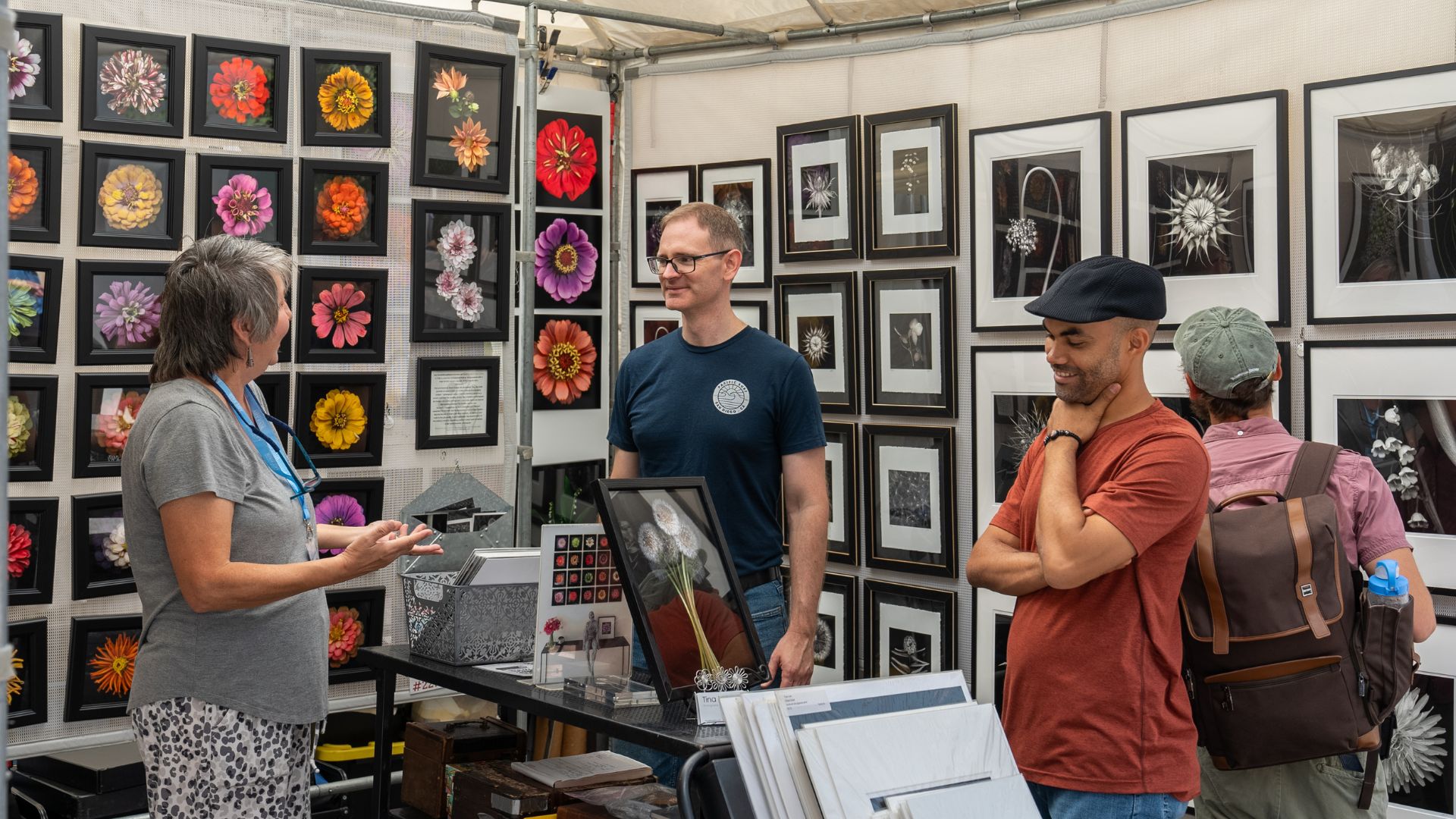 People peruse art at the Saint Louis Art Fair in Clayton.