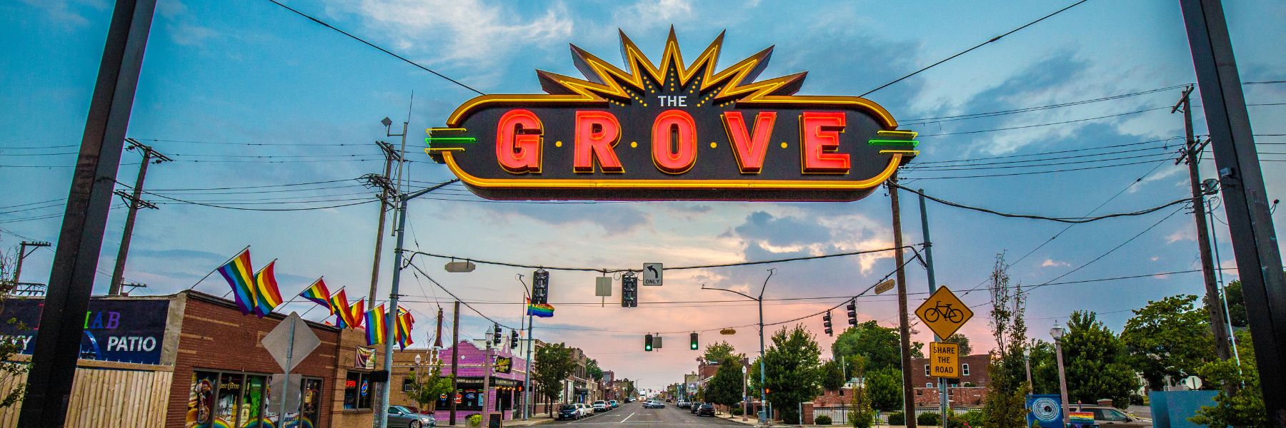 A neon sign marks the entrance of The Grove, an LGBTQIA+ hotspot in St. Louis.