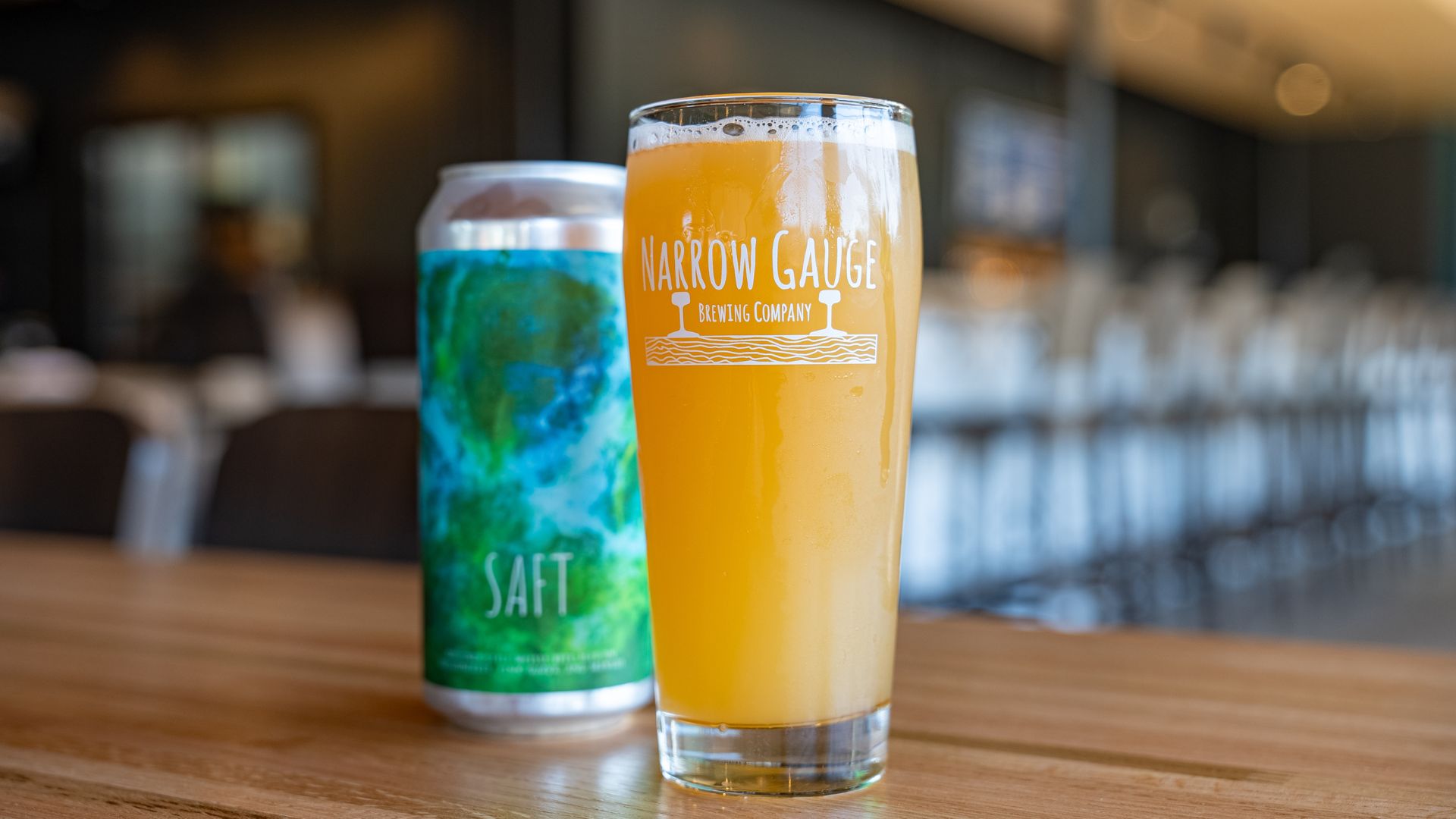 Saft, a beer from Narrow Gauge Brewing Company, sits on a table in the brewery's new taproom.