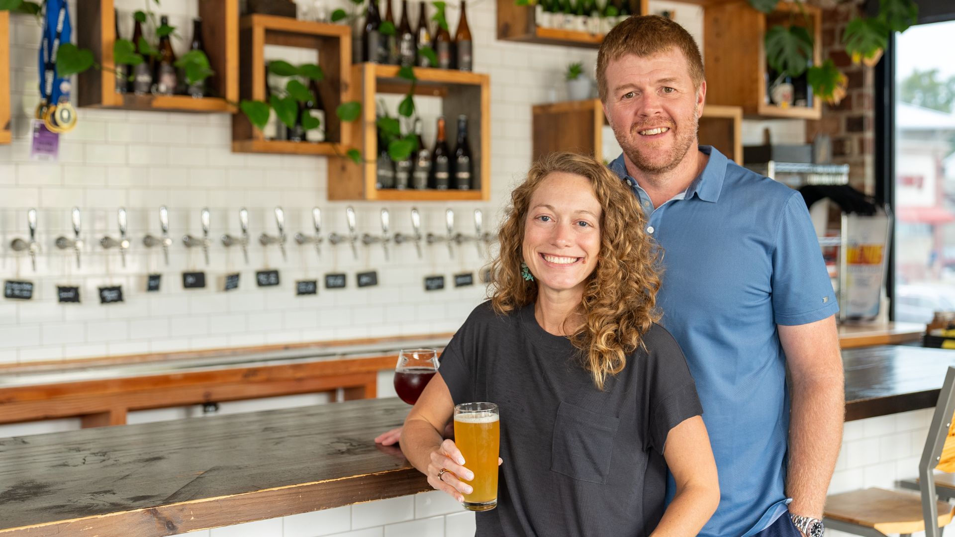 Cory and Karen King pose at Side Project Brewery in Maplewood.