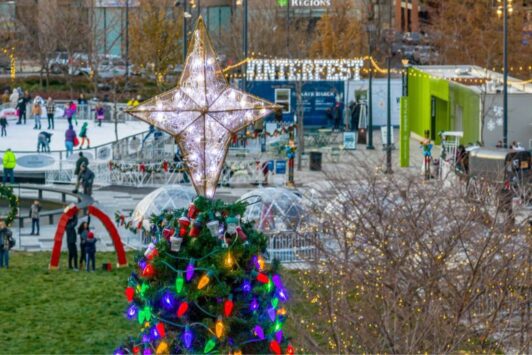 A giant lit tree stands in the middle of Winterfest in St. Louis.