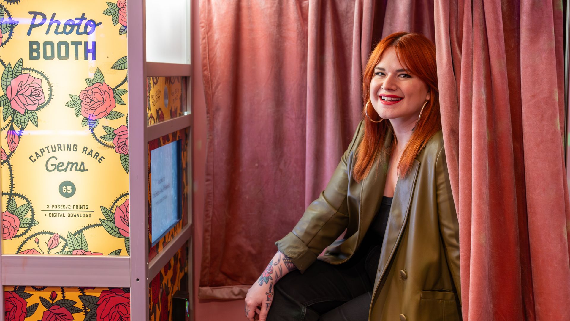 Amanda Helman poses in the photo booth at Hidden Gems in St Louis.