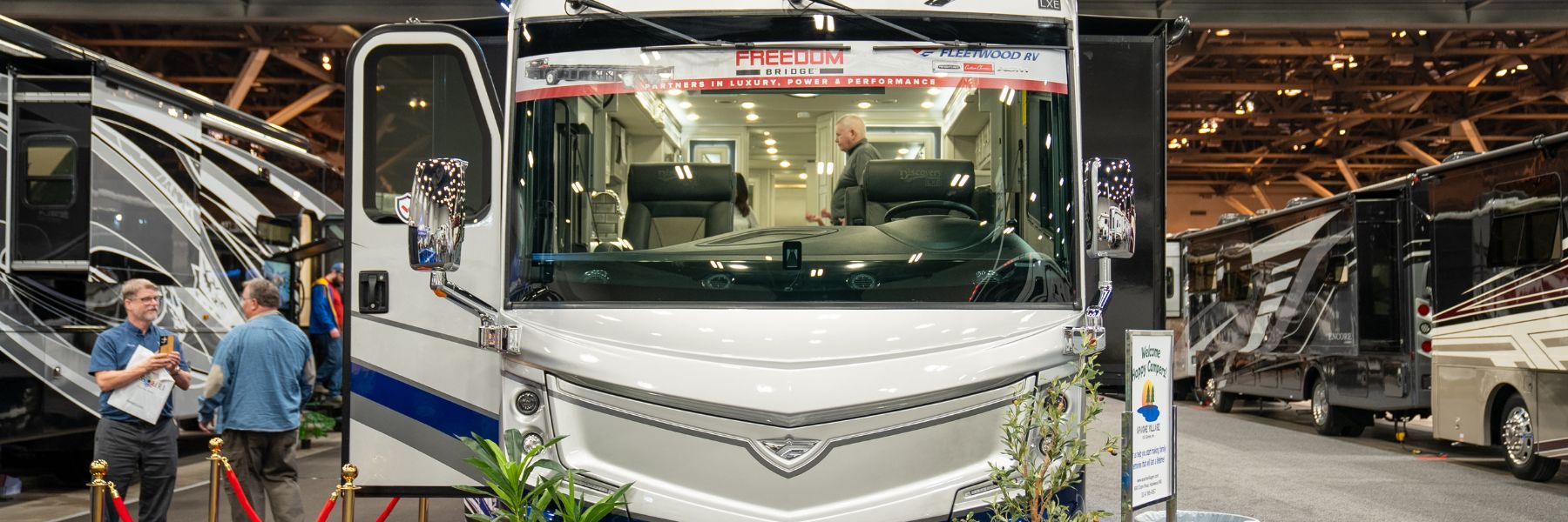 People shop for RVs at a travel show at America's Center Convention Complex.