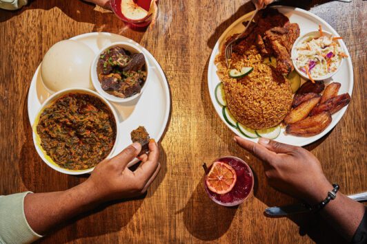 Diners enjoy dinner at Levels Nigerian Cuisine.