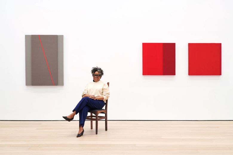 Jennie C Jones poses among her paintings, which will be displayed at the Pulitzer Arts Foundation.
