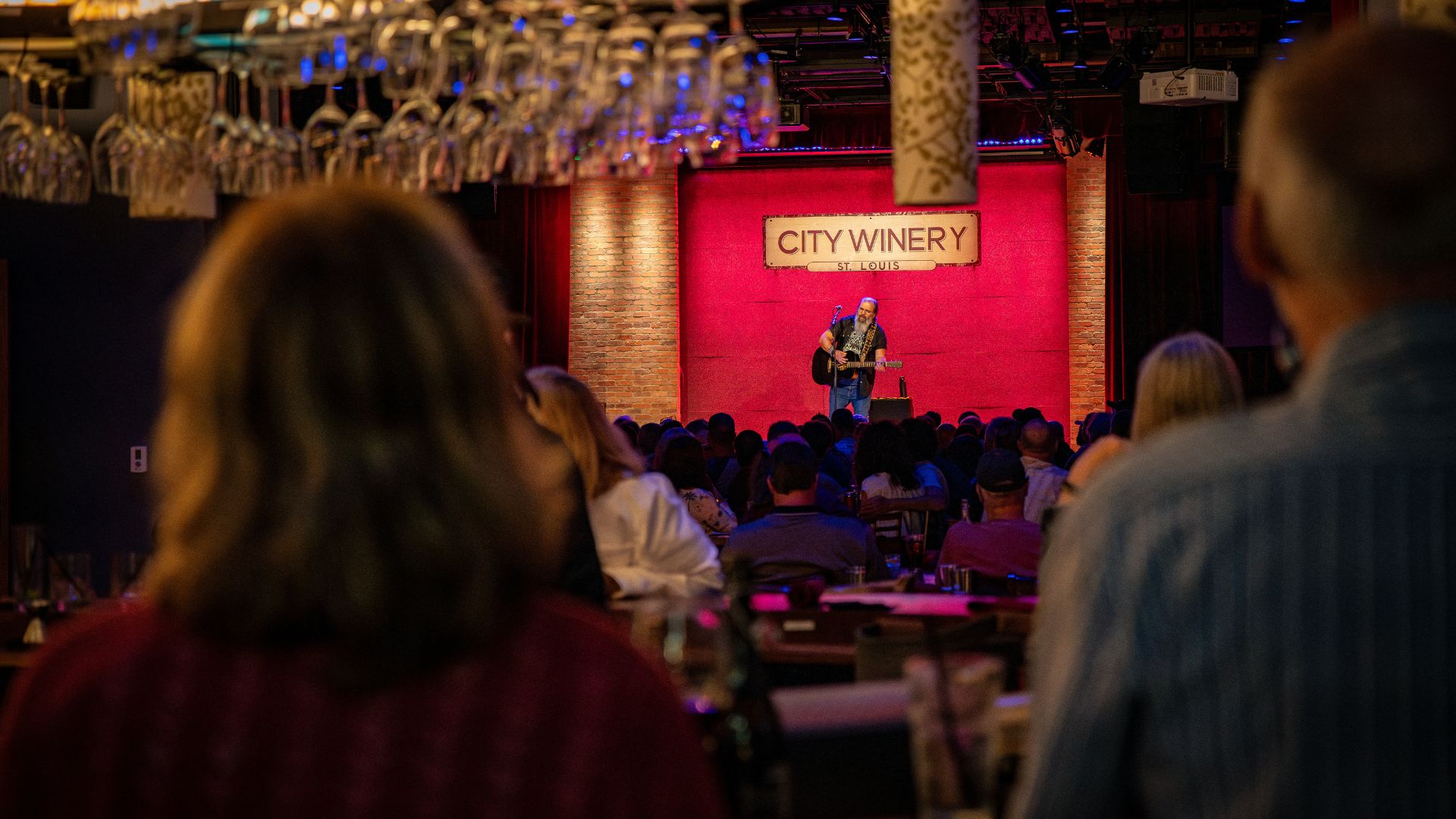 People watch a performance at City Winery St Louis.