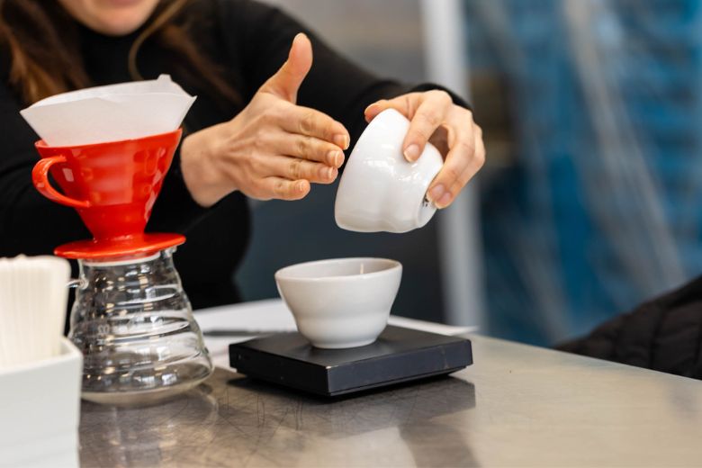 A barista pours coffee during a festival in St Louis.