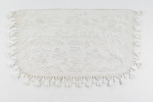 The Saint Louis Art Museum will present American needlework in white like this piece of cloth in a 2026 exhibition.