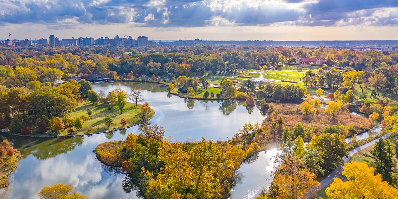 Across an aerial view of Forest Park, you can see downtown St. Louis.
