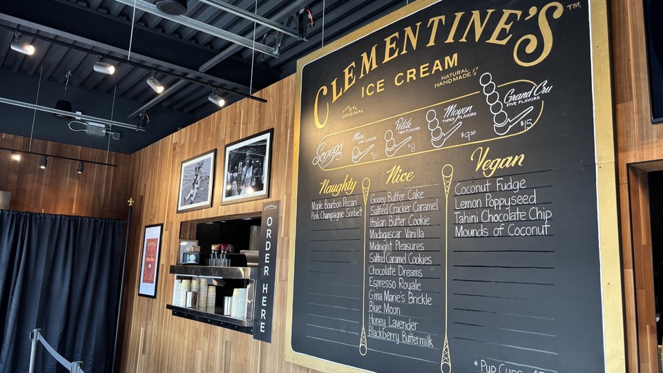 Clementine’s St. Charles chalkboard menu displaying ice cream flavors and scoop options.