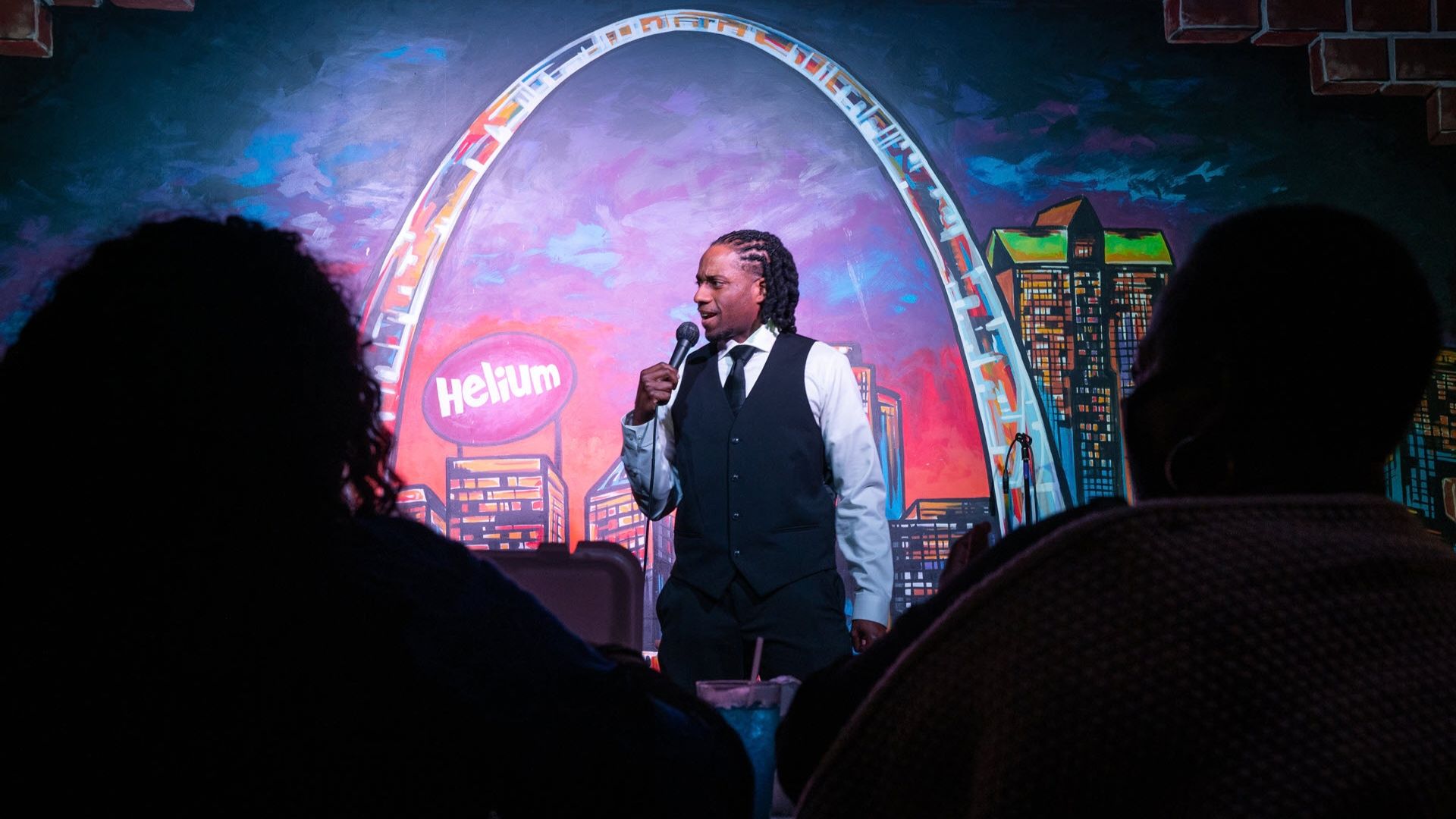 A stand-up comedian entertains couples on dates at Helium Comedy Club in St Louis.